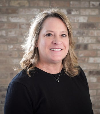 Portrait of Kat Abshire, Realtor.